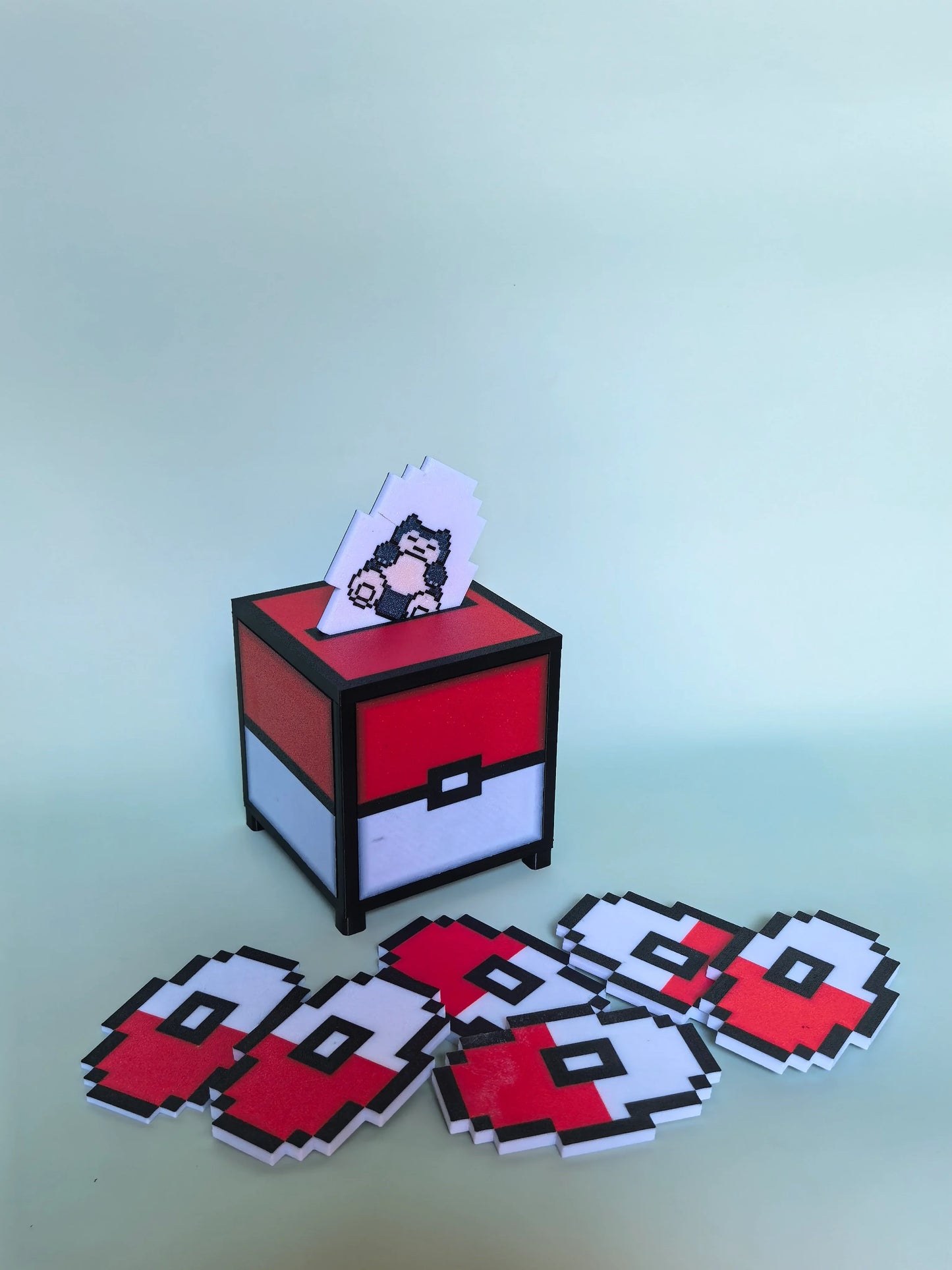 A dramatic Pokemon-inspired PixelJukebox with a sunset-to-twilight sky backdrop featuring Ash Ketchum and his starter squad — pixel-perfect NFC audio designed for the ultimate trainer.