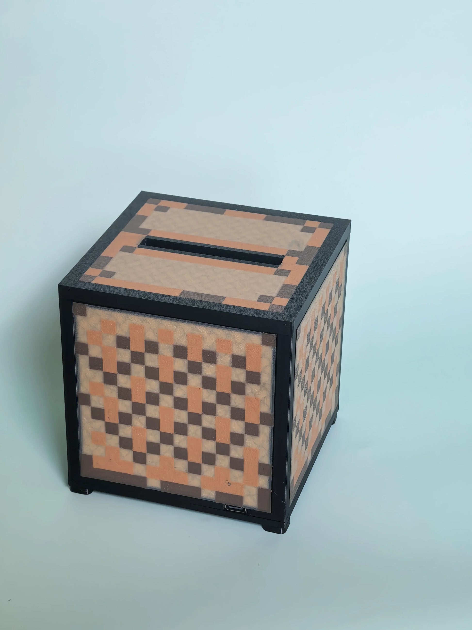 A real-life Minecraft Jukebox brought to your desk — a blocky, pixel-art NFC Music Box featuring authentic grass-block textures, diamond-blue accents, and the iconicSteve silhouette crafted in true 8-bit voxel style.